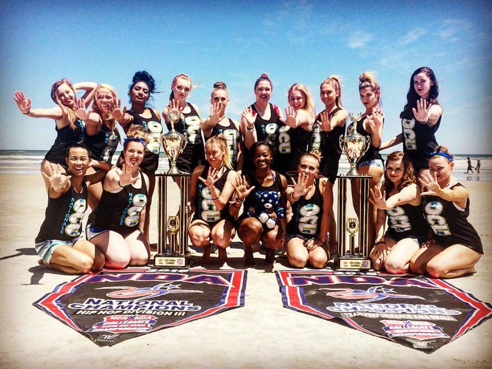 The pom squad poses with its trophies and banners for its national championship titles for team performance and hip hop on April 9 in Daytona. The wins make five national championships total for the team. Photo: Submitted