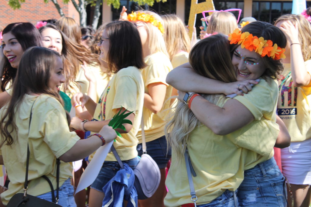 Members of Alpha Phi sorority welcome home new members on Bid Day Aug. 21. Photo: Miguel Rios